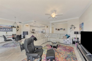 This stunning, rarely available, first level end-unit Bella Casa on Sarasota National Golf Club in Florida - for sale on GolfHomes.com, golf home, golf lot