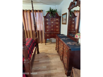 This beautiful Mountain Cabin in White Mountain Lakes has much on Silver Creek Golf Club in Arizona - for sale on GolfHomes.com, golf home, golf lot