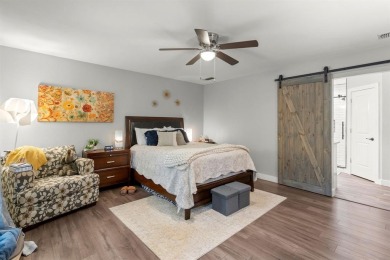 Secluded 3 bedroom 2 bath home surrounded on all 4 sides by on Holly Lake Ranch Golf Club in Texas - for sale on GolfHomes.com, golf home, golf lot