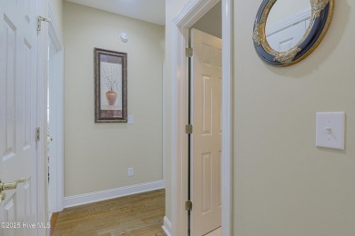 Nestled in a prestigious gated golf community, this brick home on Brunswick Plantation and Golf Resorts in North Carolina - for sale on GolfHomes.com, golf home, golf lot