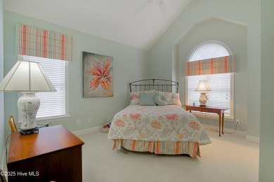Nestled in a prestigious gated golf community, this brick home on Brunswick Plantation and Golf Resorts in North Carolina - for sale on GolfHomes.com, golf home, golf lot