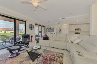 This stunning, rarely available, first level end-unit Bella Casa on Sarasota National Golf Club in Florida - for sale on GolfHomes.com, golf home, golf lot