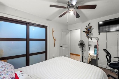 Secluded 3 bedroom 2 bath home surrounded on all 4 sides by on Holly Lake Ranch Golf Club in Texas - for sale on GolfHomes.com, golf home, golf lot