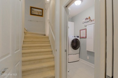 Nestled in a prestigious gated golf community, this brick home on Brunswick Plantation and Golf Resorts in North Carolina - for sale on GolfHomes.com, golf home, golf lot
