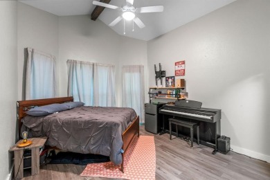 Secluded 3 bedroom 2 bath home surrounded on all 4 sides by on Holly Lake Ranch Golf Club in Texas - for sale on GolfHomes.com, golf home, golf lot
