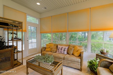 Nestled in a prestigious gated golf community, this brick home on Brunswick Plantation and Golf Resorts in North Carolina - for sale on GolfHomes.com, golf home, golf lot
