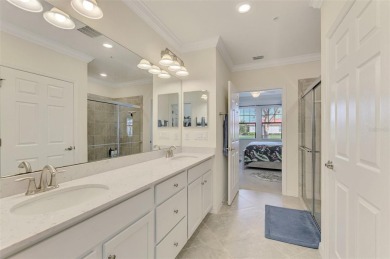 This stunning, rarely available, first level end-unit Bella Casa on Sarasota National Golf Club in Florida - for sale on GolfHomes.com, golf home, golf lot