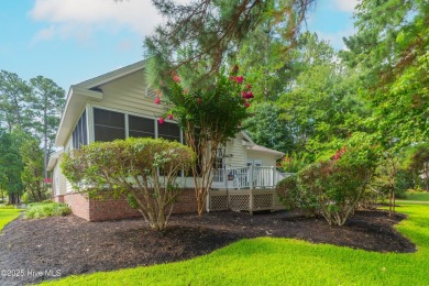 Nestled in a prestigious gated golf community, this brick home on Brunswick Plantation and Golf Resorts in North Carolina - for sale on GolfHomes.com, golf home, golf lot