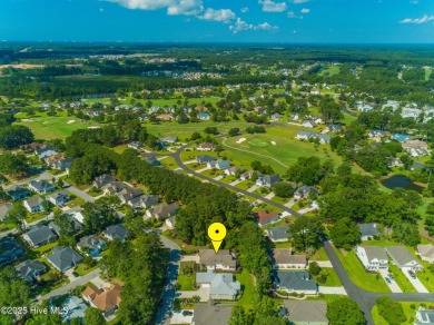 Nestled in a prestigious gated golf community, this brick home on Brunswick Plantation and Golf Resorts in North Carolina - for sale on GolfHomes.com, golf home, golf lot