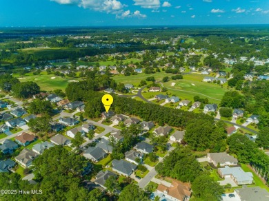 Nestled in a prestigious gated golf community, this brick home on Brunswick Plantation and Golf Resorts in North Carolina - for sale on GolfHomes.com, golf home, golf lot