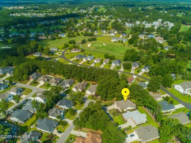 Nestled in a prestigious gated golf community, this brick home on Brunswick Plantation and Golf Resorts in North Carolina - for sale on GolfHomes.com, golf home, golf lot