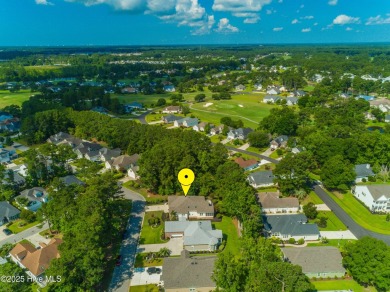 Nestled in a prestigious gated golf community, this brick home on Brunswick Plantation and Golf Resorts in North Carolina - for sale on GolfHomes.com, golf home, golf lot