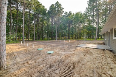 Discover this beautifully crafted home ideally situated with on Headwaters Country Club in Minnesota - for sale on GolfHomes.com, golf home, golf lot
