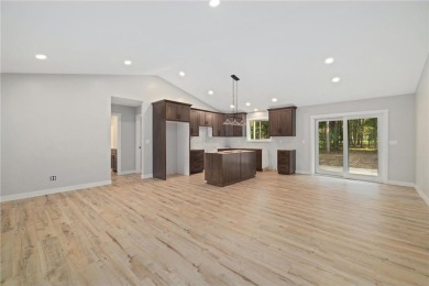 Discover this beautifully crafted home ideally situated with on Headwaters Country Club in Minnesota - for sale on GolfHomes.com, golf home, golf lot