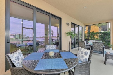 This stunning, rarely available, first level end-unit Bella Casa on Sarasota National Golf Club in Florida - for sale on GolfHomes.com, golf home, golf lot