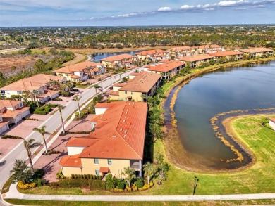 This stunning, rarely available, first level end-unit Bella Casa on Sarasota National Golf Club in Florida - for sale on GolfHomes.com, golf home, golf lot