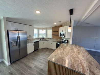 OMG! You are gonna fall in love with this absolutely gorgeous 2 on Polo Park Golf Course in Florida - for sale on GolfHomes.com, golf home, golf lot