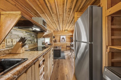 Discover the charm of this fully renovated two-bedroom on Laurel Valley Golf Course in Tennessee - for sale on GolfHomes.com, golf home, golf lot