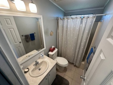 This well loved 2 bedroom, 2 bathroom Palm Harbor home is being on Del Tura Golf and Country Club in Florida - for sale on GolfHomes.com, golf home, golf lot
