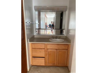 Rarely available,this 2 bedroom, 2 bath corner end- unit condo on Pearl Country Club in Hawaii - for sale on GolfHomes.com, golf home, golf lot