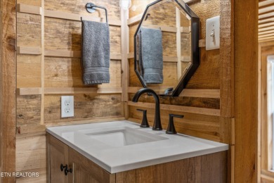 Discover the charm of this fully renovated two-bedroom on Laurel Valley Golf Course in Tennessee - for sale on GolfHomes.com, golf home, golf lot