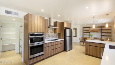 Stunning, fully renovated corner-unit townhome in a vibrant 55+ on Omni Tucson National Golf Resort and Spa - Catalina in Arizona - for sale on GolfHomes.com, golf home, golf lot