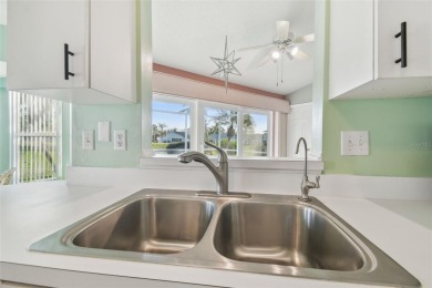 Under contract-accepting backup offers. PRICE REDUCED!!!  Run! on Caloosa Greens Executive Golf Course in Florida - for sale on GolfHomes.com, golf home, golf lot