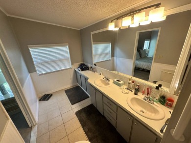 This well loved 2 bedroom, 2 bathroom Palm Harbor home is being on Del Tura Golf and Country Club in Florida - for sale on GolfHomes.com, golf home, golf lot
