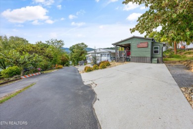 Discover the charm of this fully renovated two-bedroom on Laurel Valley Golf Course in Tennessee - for sale on GolfHomes.com, golf home, golf lot