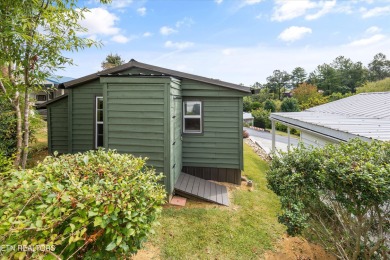 Discover the charm of this fully renovated two-bedroom on Laurel Valley Golf Course in Tennessee - for sale on GolfHomes.com, golf home, golf lot