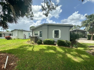 This well loved 2 bedroom, 2 bathroom Palm Harbor home is being on Del Tura Golf and Country Club in Florida - for sale on GolfHomes.com, golf home, golf lot