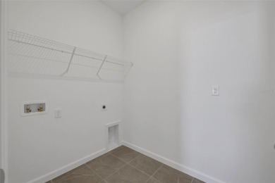 One or more photo(s) has been virtually staged. Now showcasing on Fishermans Cove Golf and Marina in Florida - for sale on GolfHomes.com, golf home, golf lot