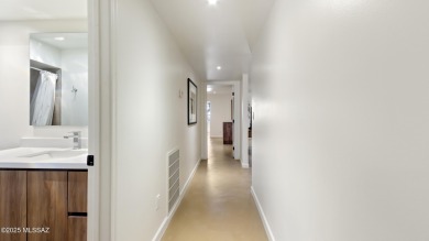 Stunning, fully renovated corner-unit townhome in a vibrant 55+ on Omni Tucson National Golf Resort and Spa - Catalina in Arizona - for sale on GolfHomes.com, golf home, golf lot