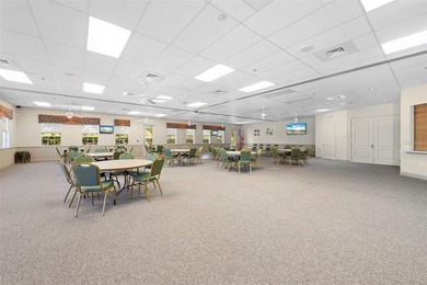 Nestled in the highly sought-after gated community of Bobcat on Bobcat Trail Golf Club in Florida - for sale on GolfHomes.com, golf home, golf lot