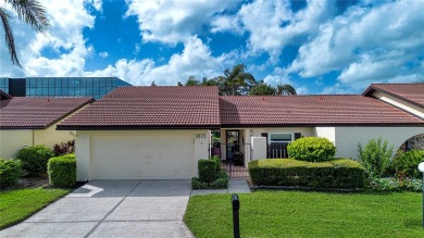 Wow. Don't miss this stylish, serene villa in Sarasota's 55+ on Village Green Golf Club of Sarasota in Florida - for sale on GolfHomes.com, golf home, golf lot