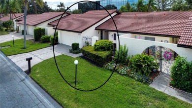 Wow. Don't miss this stylish, serene villa in Sarasota's 55+ on Village Green Golf Club of Sarasota in Florida - for sale on GolfHomes.com, golf home, golf lot