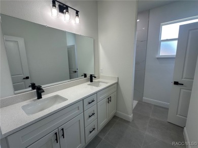 Discover this stunning, brand-new home in Citrus Springs on Citrus Springs Country Club in Florida - for sale on GolfHomes.com, golf home, golf lot