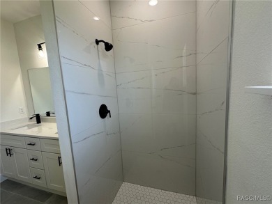Discover this stunning, brand-new home in Citrus Springs on Citrus Springs Country Club in Florida - for sale on GolfHomes.com, golf home, golf lot