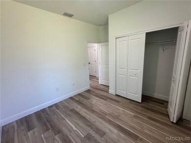 Discover this stunning, brand-new home in Citrus Springs on Citrus Springs Country Club in Florida - for sale on GolfHomes.com, golf home, golf lot