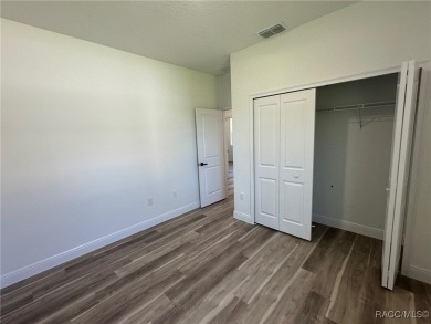 Discover this stunning, brand-new home in Citrus Springs on Citrus Springs Country Club in Florida - for sale on GolfHomes.com, golf home, golf lot