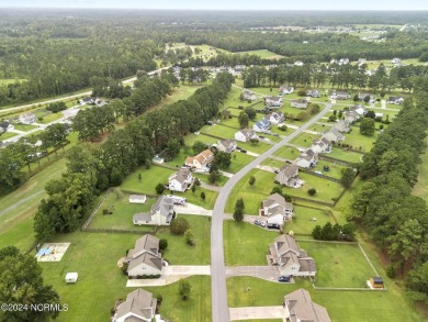 Welcome to this beautifully maintained 4-bedroom, 2.5-bath home on Rock Creek Country Club in North Carolina - for sale on GolfHomes.com, golf home, golf lot