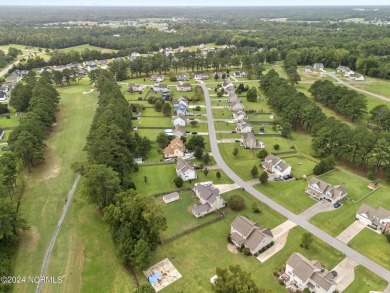 Welcome to this beautifully maintained 4-bedroom, 2.5-bath home on Rock Creek Country Club in North Carolina - for sale on GolfHomes.com, golf home, golf lot