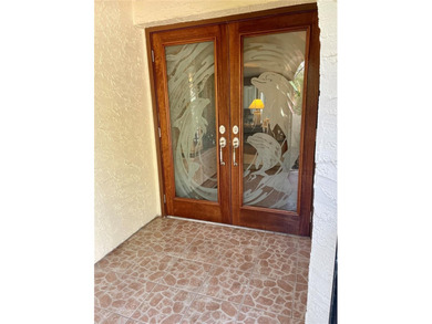 BEAUTIFUL VIZCAYA BOUGAINVILLEA UNIT. This first-floor unit on IMG Academies Golf and Country Club in Florida - for sale on GolfHomes.com, golf home, golf lot