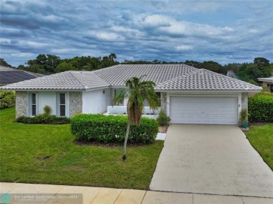 This home boasts the most magnificent view in Boca Greens! The on Boca Greens Country Club in Florida - for sale on GolfHomes.com, golf home, golf lot