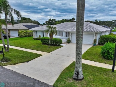 This home boasts the most magnificent view in Boca Greens! The on Boca Greens Country Club in Florida - for sale on GolfHomes.com, golf home, golf lot