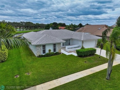 This home boasts the most magnificent view in Boca Greens! The on Boca Greens Country Club in Florida - for sale on GolfHomes.com, golf home, golf lot