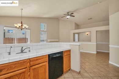 Welcome to this beautifully updated 4-bedroom, 2-bath home on Van Buskirk Municipal Golf Course in California - for sale on GolfHomes.com, golf home, golf lot