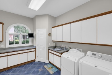 Discover classic lowcountry living in this elegant all-brick on Heritage Club in South Carolina - for sale on GolfHomes.com, golf home, golf lot