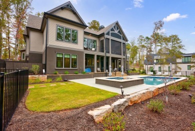 Discover unparalleled luxury and elegance in this brand-new on Reynolds Lake Oconee - The Oconee in Georgia - for sale on GolfHomes.com, golf home, golf lot
