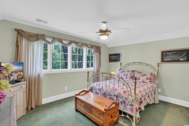 Discover classic lowcountry living in this elegant all-brick on Heritage Club in South Carolina - for sale on GolfHomes.com, golf home, golf lot